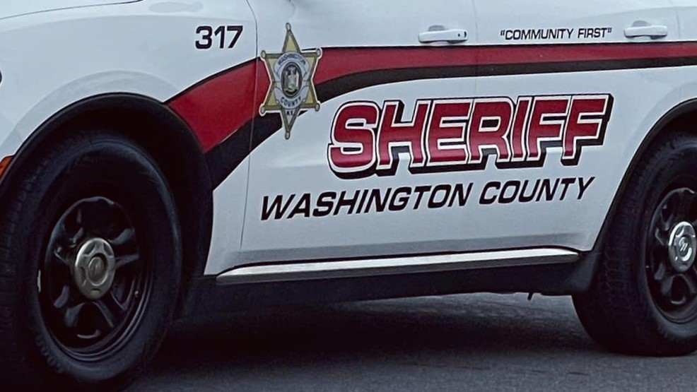 red black and white police patrol car featuring the Washington County Sheriff’s Office badge logo